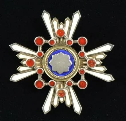 Japanese  Order of Sacred Treasure  converted into Jewelry.jpg