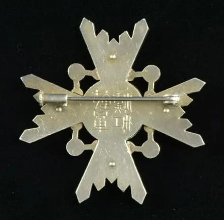 Japanese  Order of Sacred Treasure converted into  Jewelry.jpg