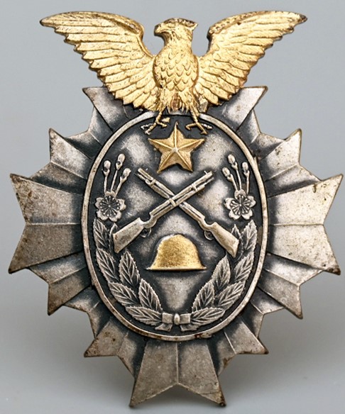 琿春駐屯歩兵隊満国境出動記念章.jpg