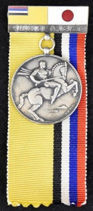 July 1938 Japan-Manchukuo Track and Field Competition Commemorative Badge ..jpg