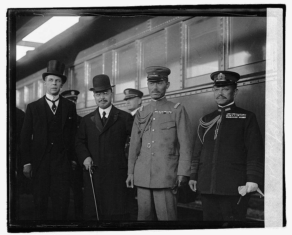 Kunishige Tanaka next to train.jpg