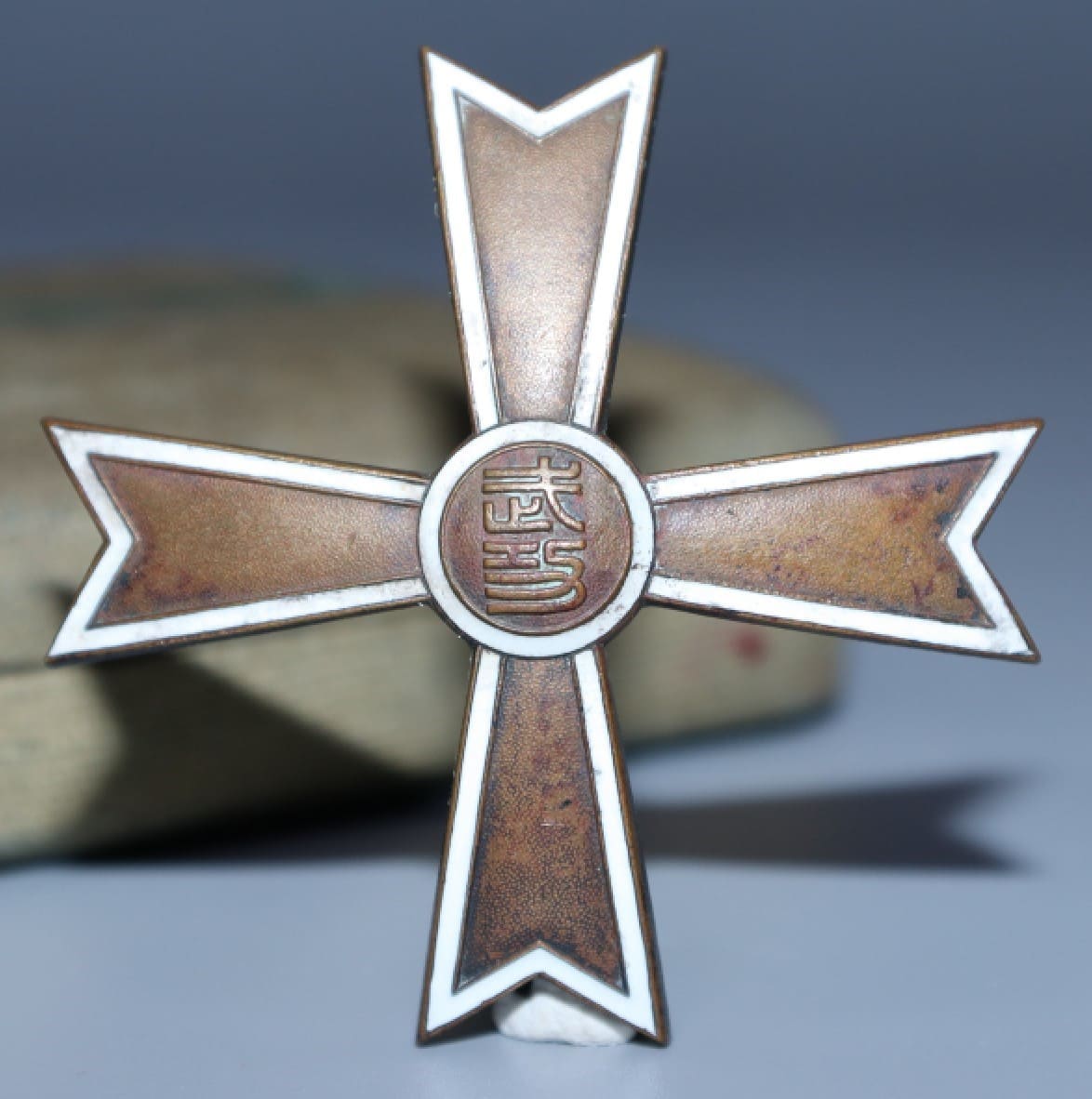 Manchukuo 3rd class Military Merit Badge.jpg
