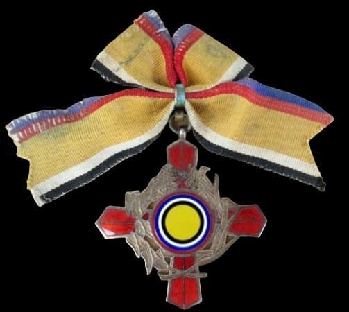 Manchukuo  Anda  Prefecture Silver  Medal.jpg