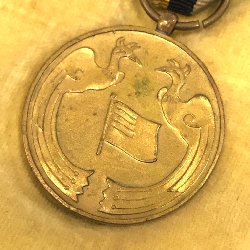 Manchukuo Foundation Commemorative Medal建国大典記念章5.jpg