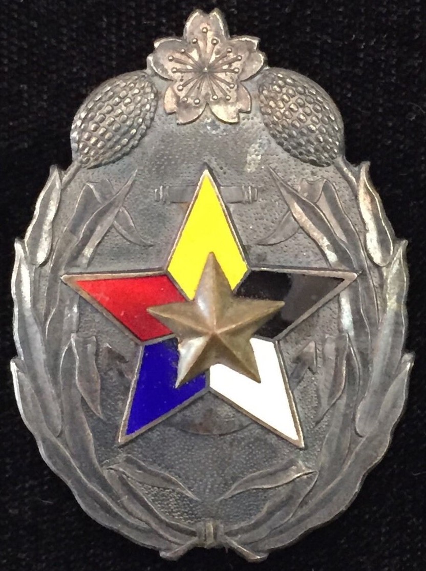 Manchukuo Meritorious Supporter's   Badge.jpg