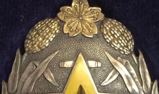Manchukuo Meritorious Supporter's Badge.jpg