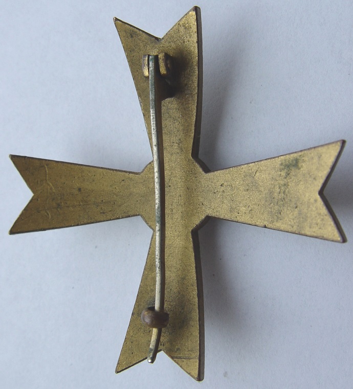 Manchukuo Military Merit Badge大満州国武功徽章.JPG