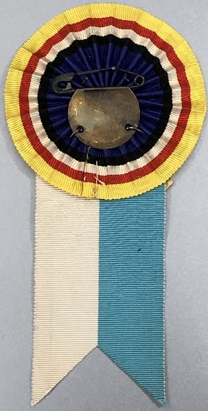 Manchukuo  National Capital Construction Commemorative Ceremony Badge.jpg