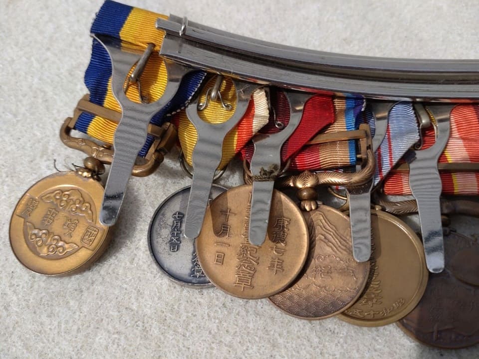 medal bar  with three Manchukuo medals.jpg