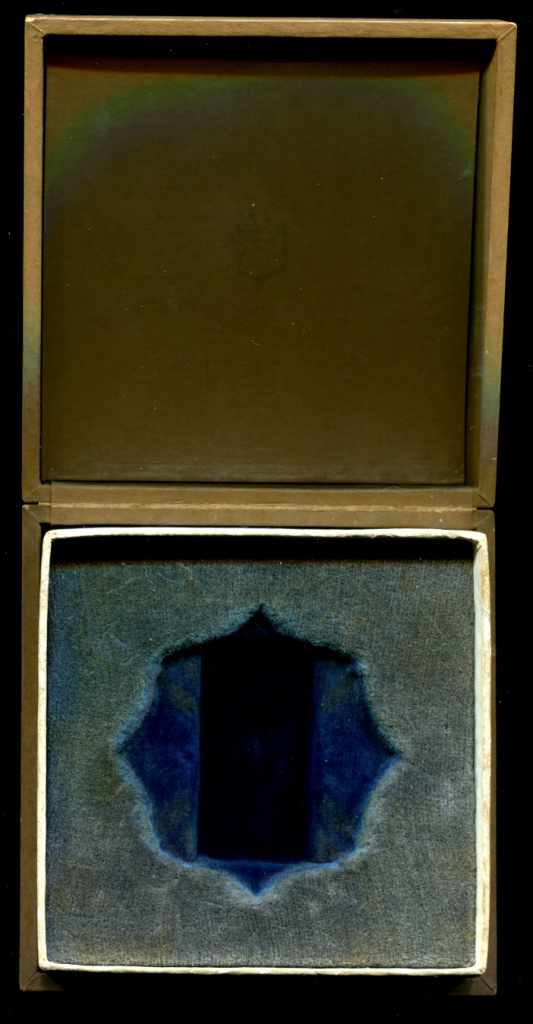 Mengjiang Autonomous  Government Genghis Khan Military Merit Badge.jpg