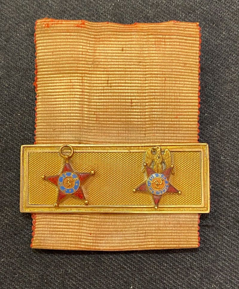 Miniature bar in gold with Royal Order of Spain.jpg