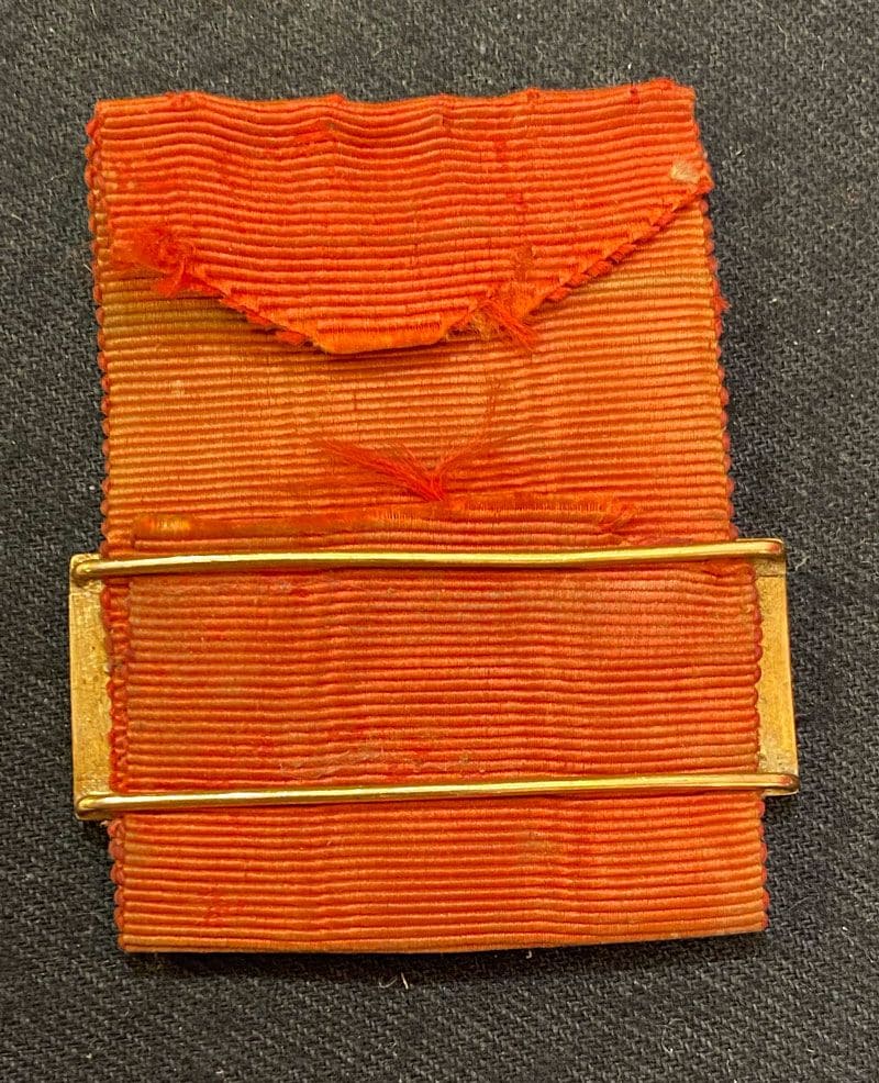 Miniature  bar in gold with Royal Order of Spain.jpg