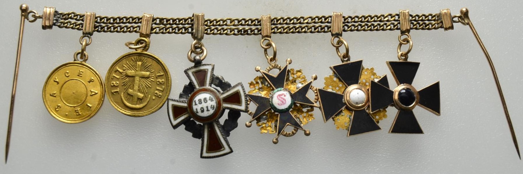 Miniature chain  with six miniatures of awards.jpg