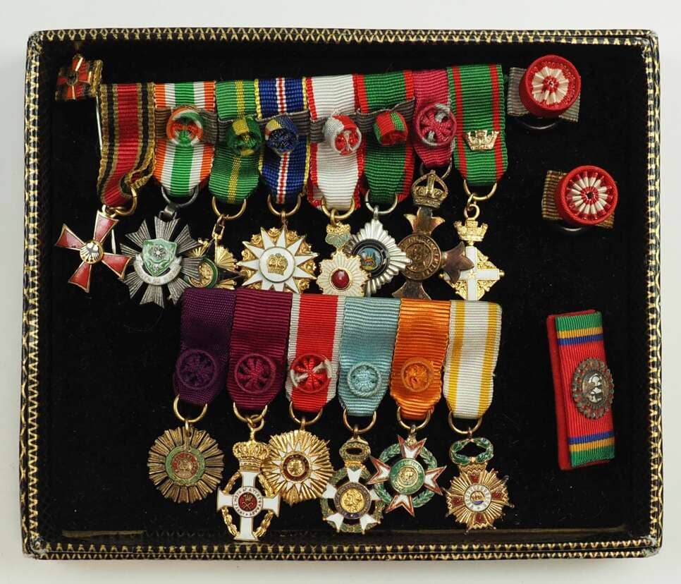 Miniature group of 14 awards that belonged to a German diplomat.jpeg
