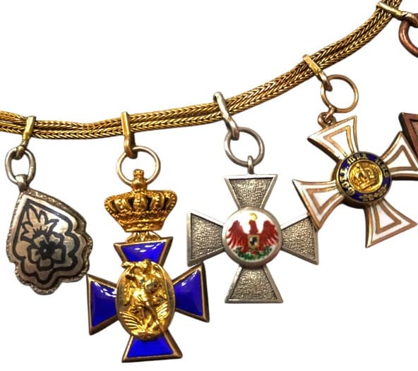 Miniature group  with Japanese Order of Sacred Treasure.jpg