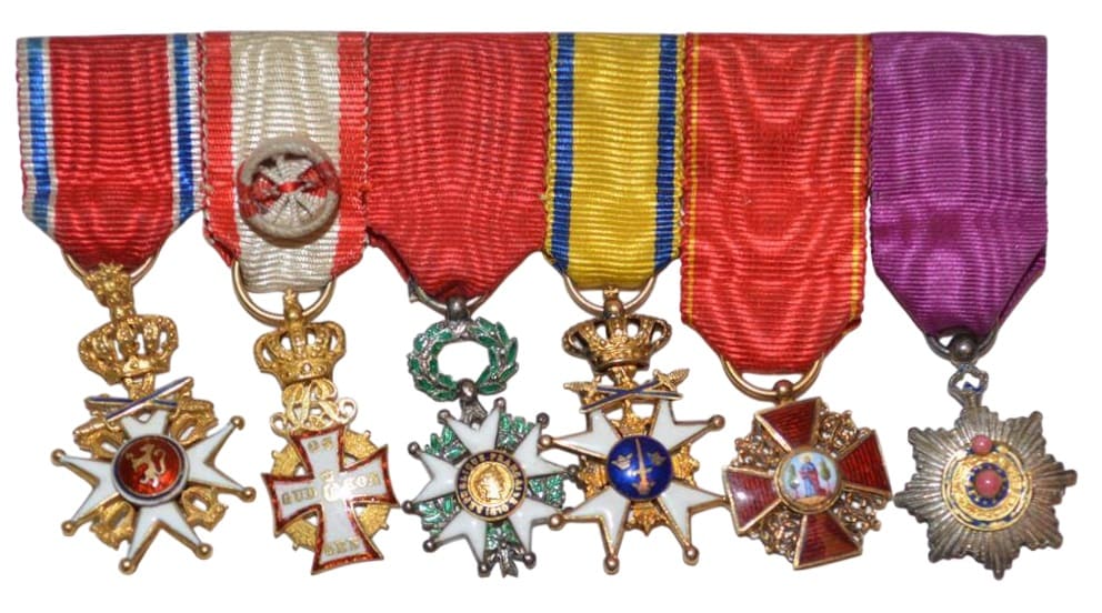 Norwegian group of miniatures with Saint Anna order and Chinese Double Dragon order.jpg