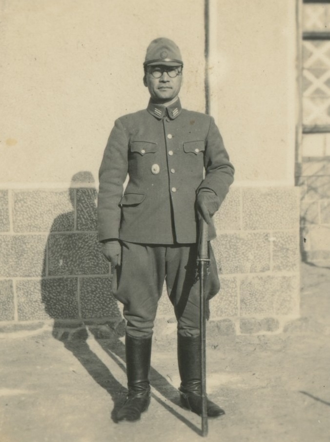 Officer with Sword & Commander Badge c.1940's.jpeg