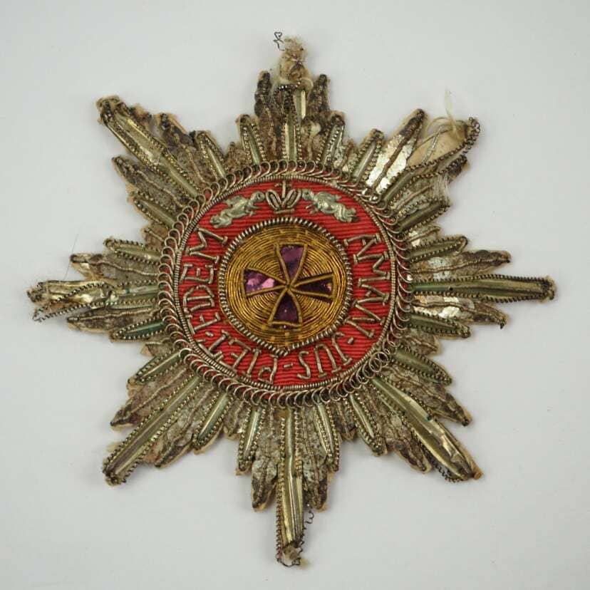 Officially issued Kapitul embroidered breast star of Saint Anna order.jpeg
