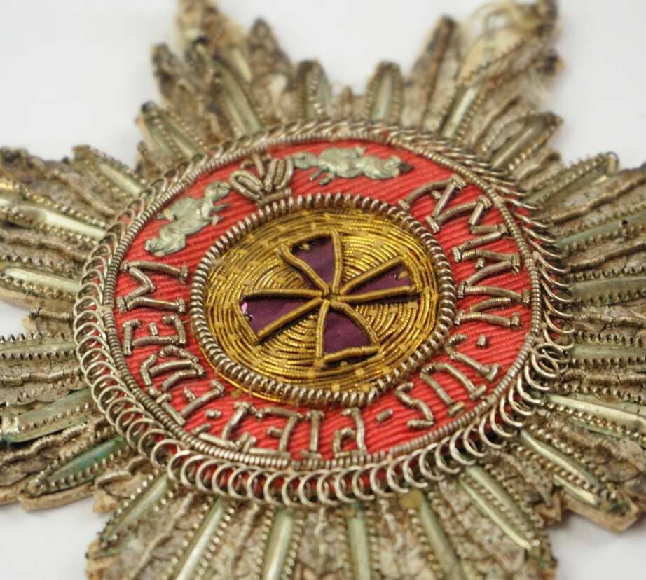 Officially issued  Kapitul embroidered breast star  of Saint Anna order.jpeg