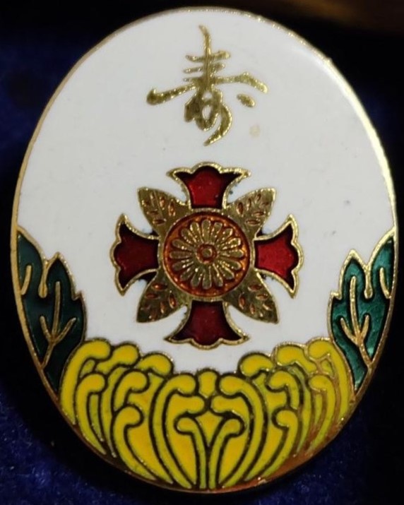 Oval White Enamelled Badge of Disabled Veterans Association.jpg
