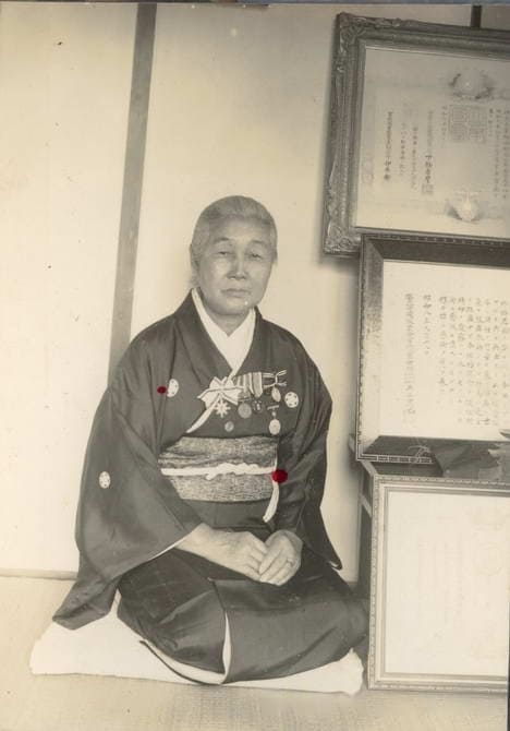 Photo with Greater Japan Women's Patriotic Association Badges.jpeg