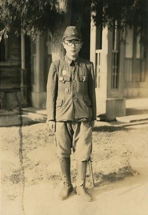Photo with Japanese Commanding Officer's Badge.jpeg