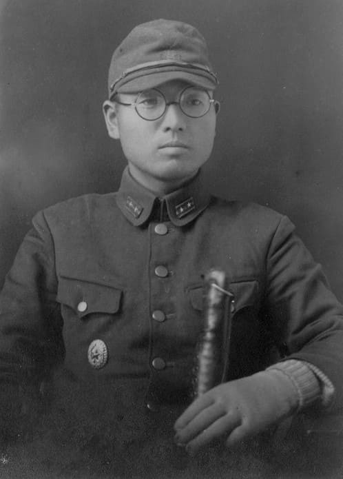 Photo with  Japanese Commanding Officer's Badge.jpg