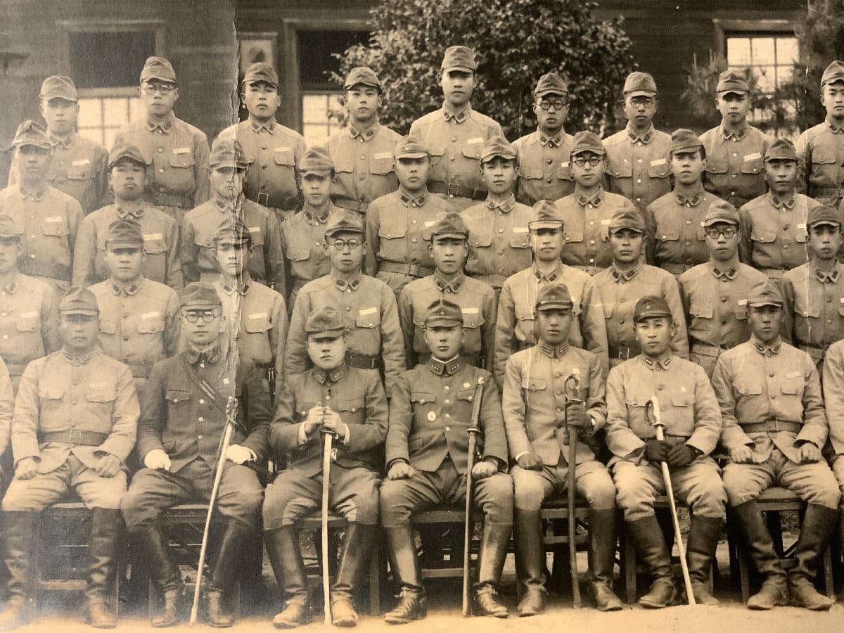Photo with Japanese  Commanding Officer's Badge.jpg