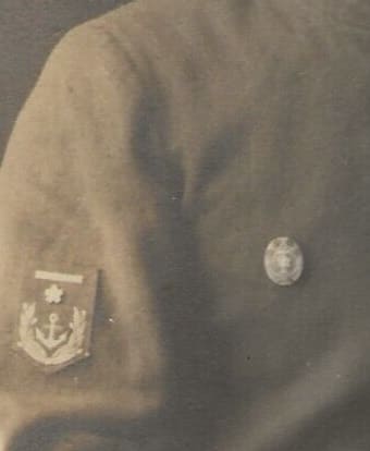 Photo with Navy  Short-Term Active Service Completion Badge.jpg