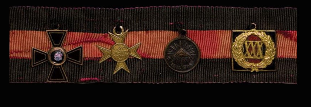 Ribbon with four tailcoat awards.jpg
