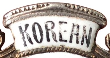 Russian-made badge for Korean Delegation in St.Petersburg.jpg