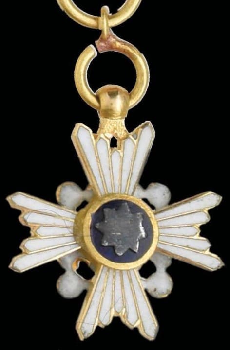 Sacred Treasure miniature  in gold.jpg
