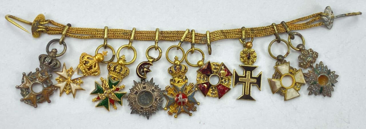 Salty nine place European-made  chain of miniatures.jpg