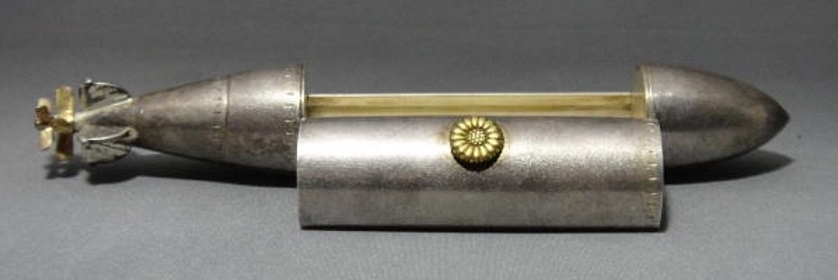 Silver bonbonniere in the form of torpedo.jpg