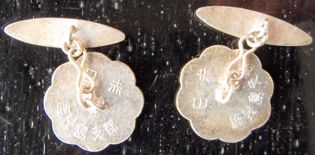 Сufflinks of Japanese  Red Cross Society.jpg