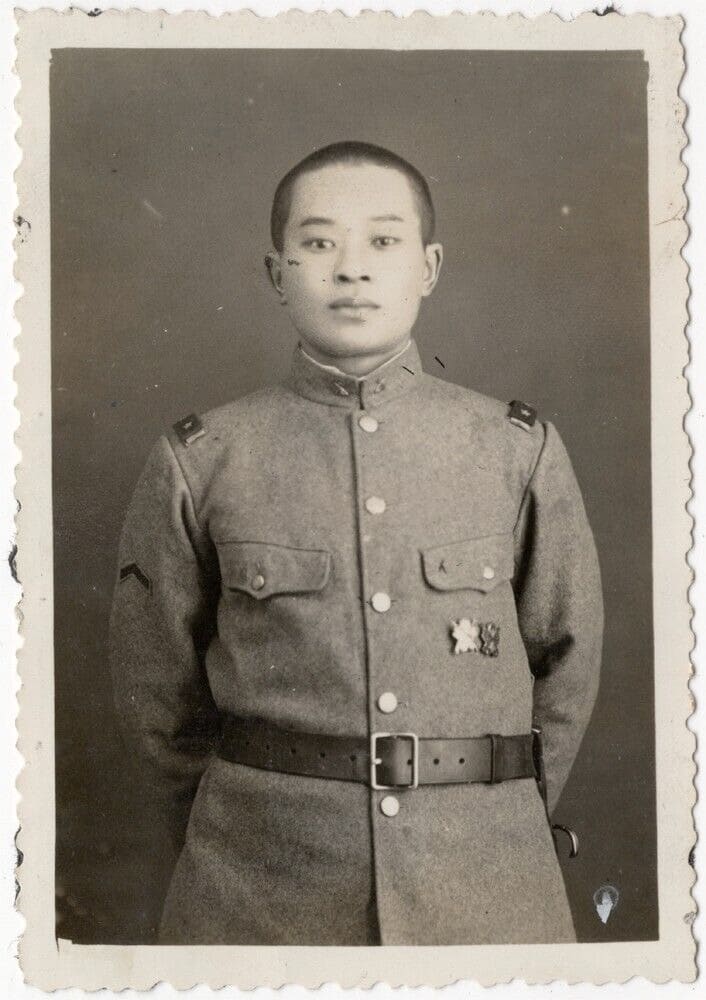 Superior private with two army marksmanship badges.jpg