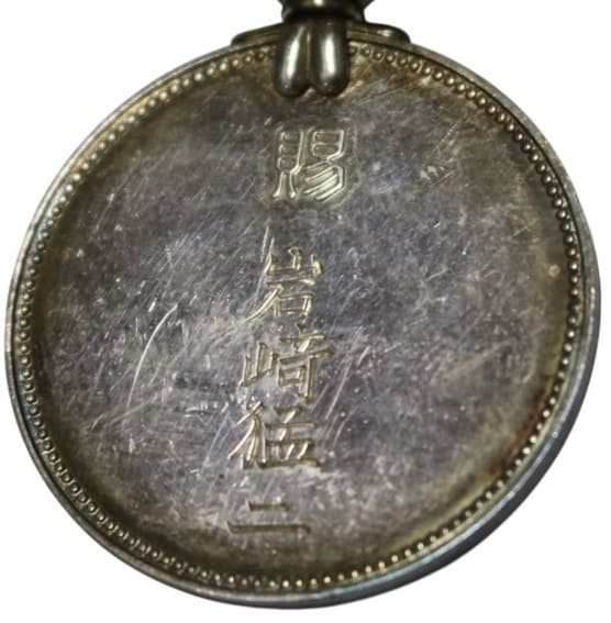 岩﨑猛二 Takeji Iwasaki.jpg
