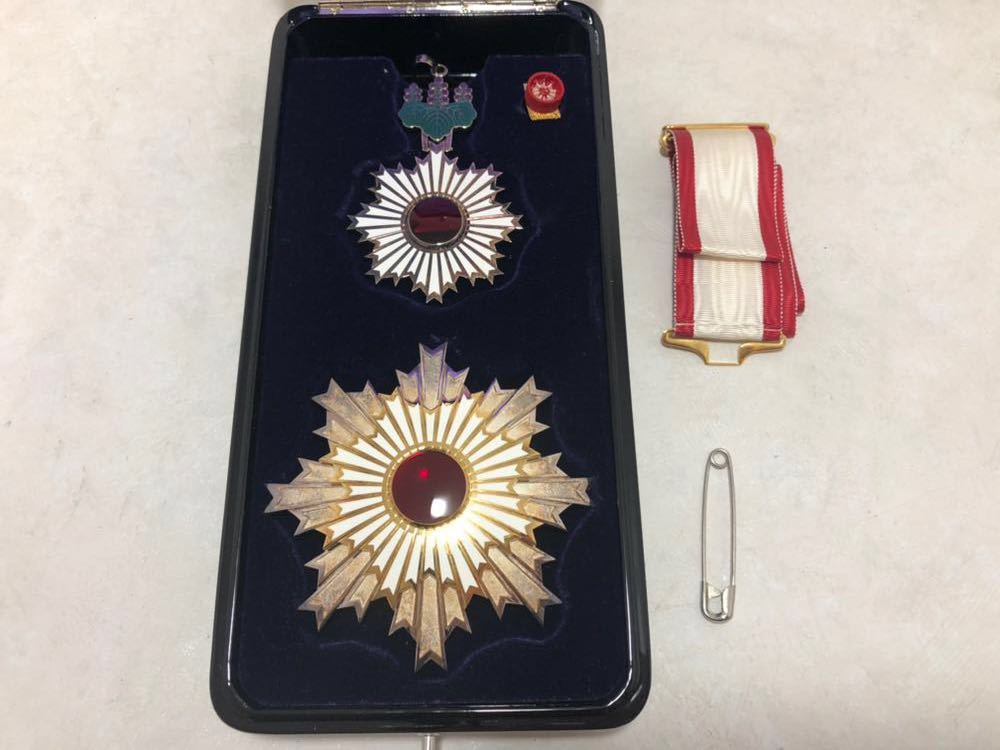 Trident  Breast  Stars of the Order of Rising Sun.jpg