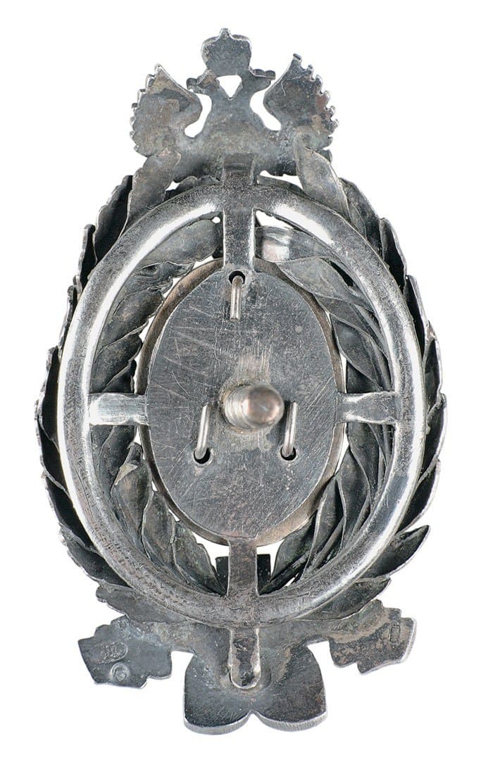 Знак в память  50-летия земских учреждений клеймо БК.jpg