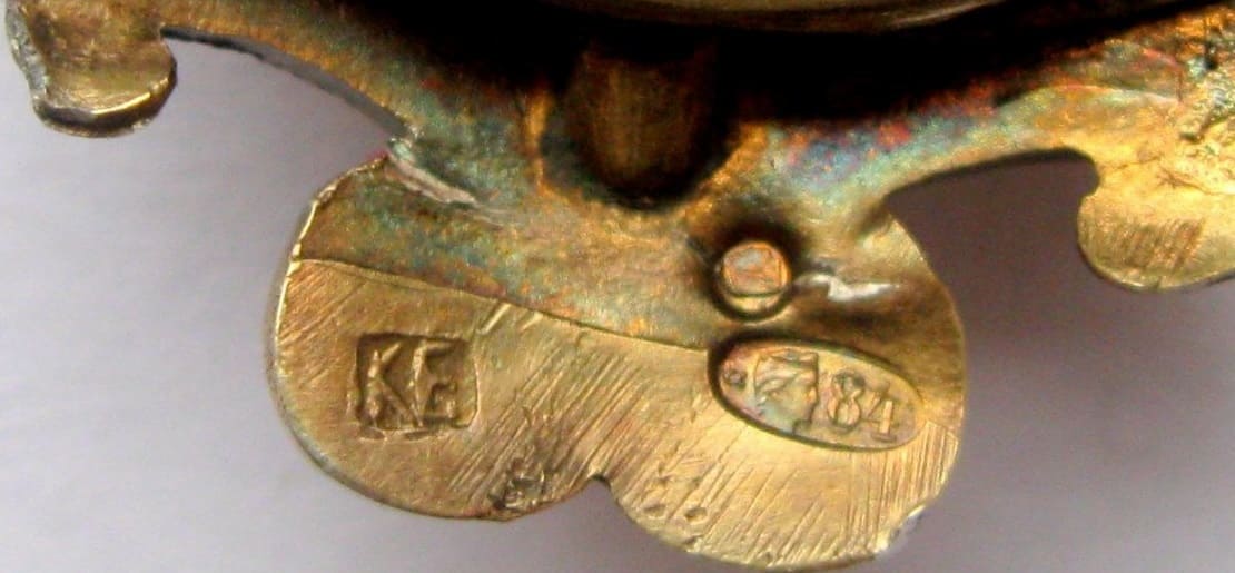 Знак в память 50-летия земских учреждений  клеймо КЕ.jpg